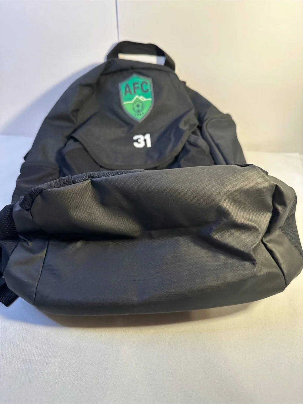 Nike Black Backpack with Green AFC Crest and White Accents